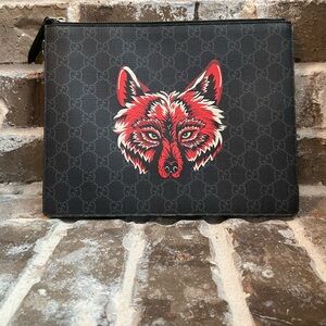 Gucci GG Supreme Wolf Print Pouch from the Bestiary collection